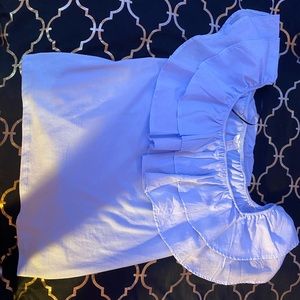 A never before worn XL off the shoulder blue top